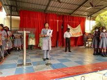 Aksharasree delivering a speech about her journey to regional level venue. 